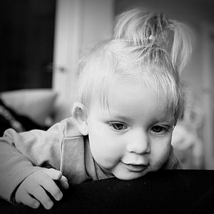 Close-up portrait of cute boy at home