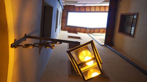 Illuminated lamp by building