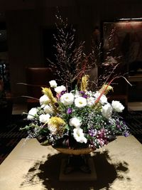 Close-up of flower vase on table