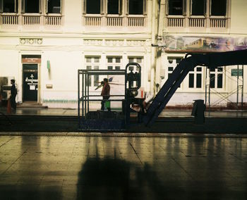 Man standing in front of building