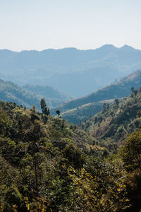 Scenic view of landscape and mountains against sky