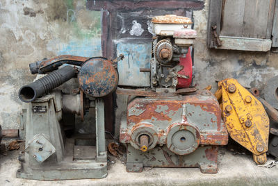 Close-up of abandoned machine parts
