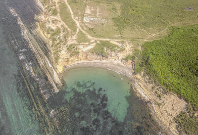 High angle view of water on land by sea