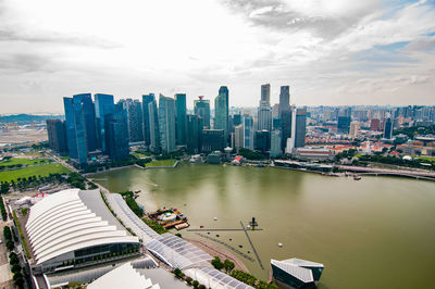 High angle view of buildings in city against sky