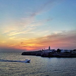 Scenic view of sea at sunset