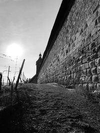 Cobblestone street against sky