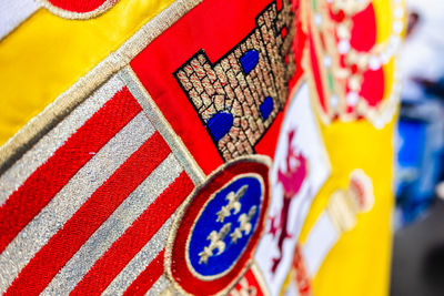 Close-up of multi colored flags