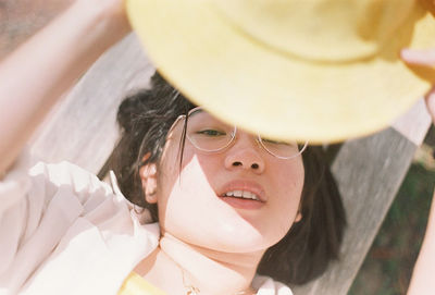 Portrait of young woman wearing sunglasses