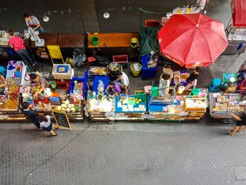 People at market stall in city