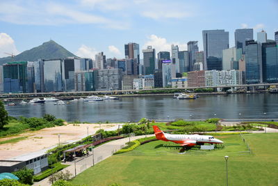 Panoramic view of river and buildings against sky