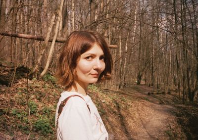 Portrait of a teenage girl in forest