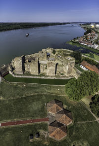 High angle view of fort by sea against sky