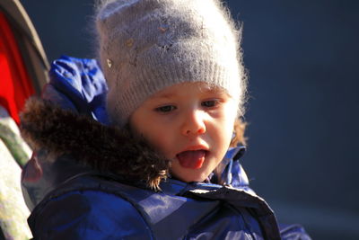 Portrait of cute boy in snow