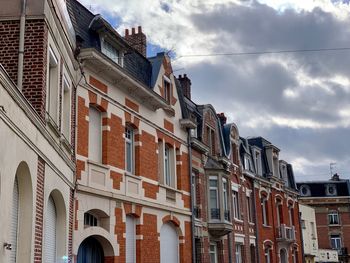 Low angle view of residential building against sky