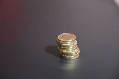 Close-up of coins on table