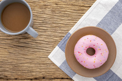 High angle view of coffee cup on table