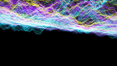 Light trails in water against black background