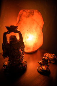 Close-up of angel statue on table