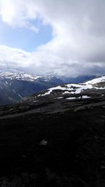 Scenic view of sea against sky during winter