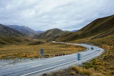 Country road passing through mountains