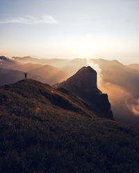 Scenic view of mountains against sky during sunset