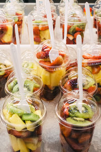 Close-up of fruits in glass on table