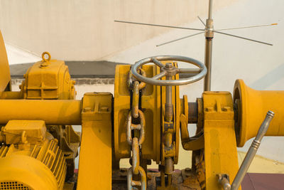 Yellow machine part in factory