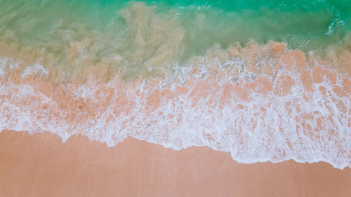 High angle view of surf on beach