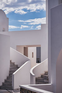 White house with stairs in fira village - santorini, greece - architecture, clean, minimal