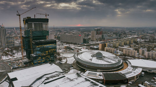 High angle view of buildings in city during winter