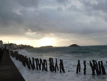 Scenic view of sea against sky at sunset
