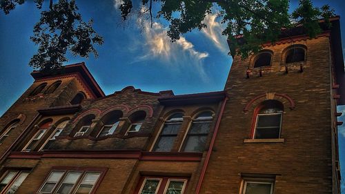 Low angle view of built structure against blue sky