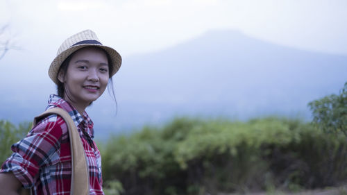 Happpy yoing girl at beautiful view point at phu pa po loei thailand.