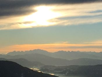 Scenic view of mountains against sky during sunset