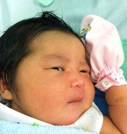 Close-up of newborn baby at hospital
