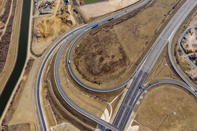 Aerial view of highway on land