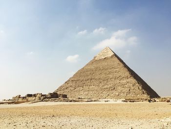 Great pyramid of giza at desert against sky