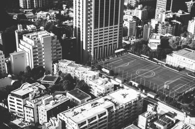 High angle view of street amidst buildings in city