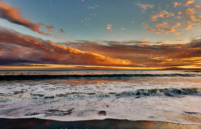 Scenic view of sea against sky during sunset