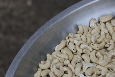 Close-up of cashews in container