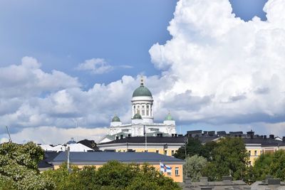 Building against cloudy sky