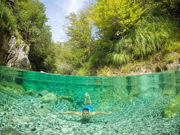 Woman swimming in sea