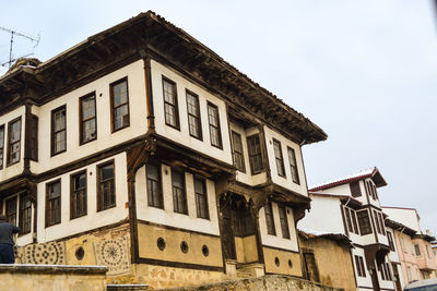 Low angle view of old building against sky