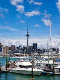 Boats moored at harbor