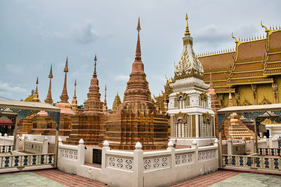 Temple in building against sky