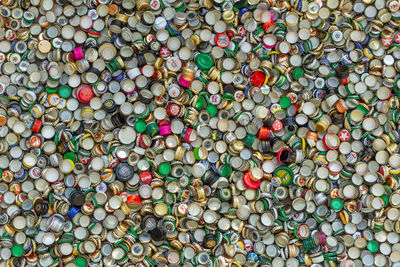 Berlin, germany , may 12, 2018 - enormous quantity of metal beer caps, alcoholic beverages caps 