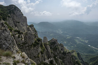 Scenic view of rocky mountains against sky