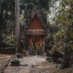 View of temple against building