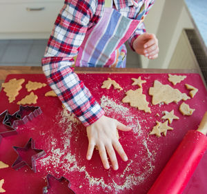 Girl making cookies at home