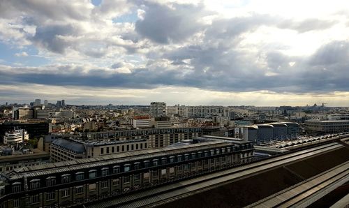 High angle view of buildings against sky in city